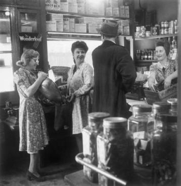 Grocer's Shop in Silvertown 1944, just visible in top right corner jars of Dundee Marmalade. ©IWM 